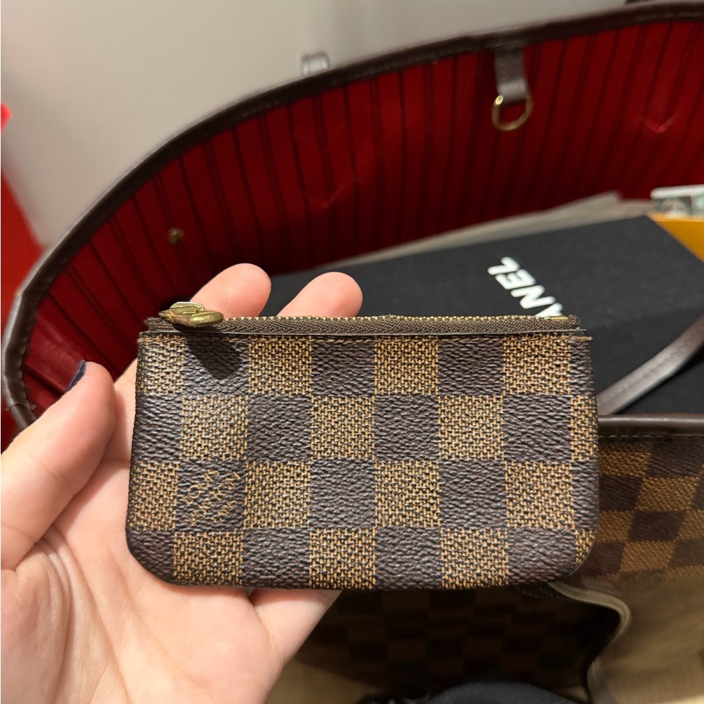 Louis Vuitton checkered coin purse with keychain